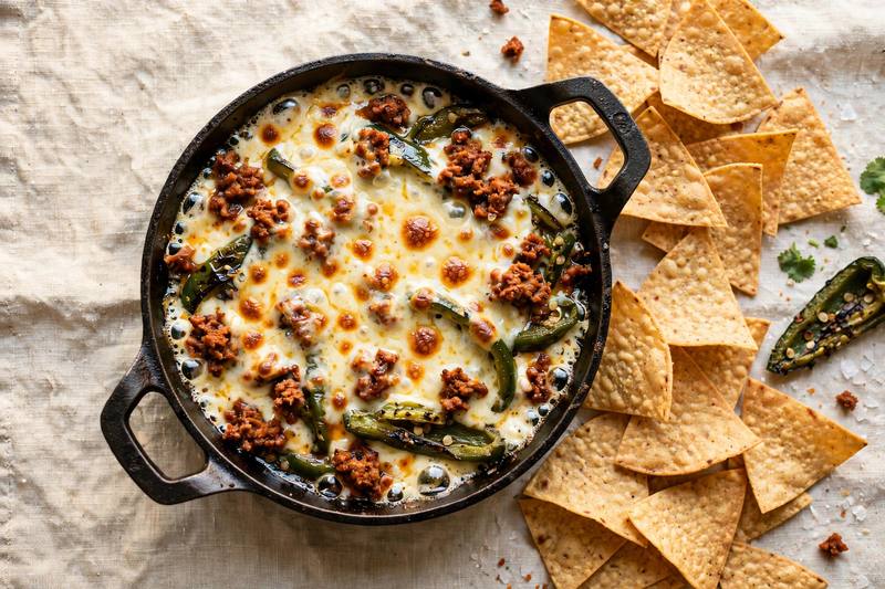 Photo of Queso Fundido with Tortilla Chips, a snack recipe from FluentFuel