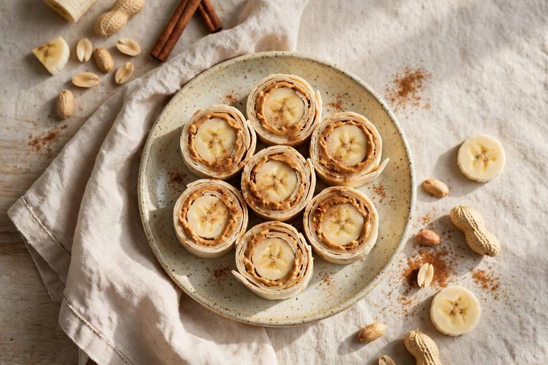 Photo of Banana Peanut Sushi Rolls, a snack recipe from FluentFuel