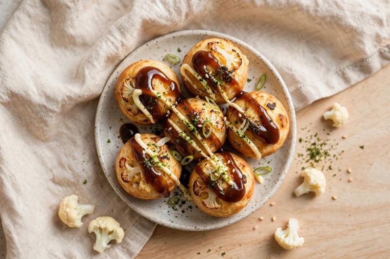 Photo of Cauliflower Takoyaki Bites, a snack recipe from FluentFuel